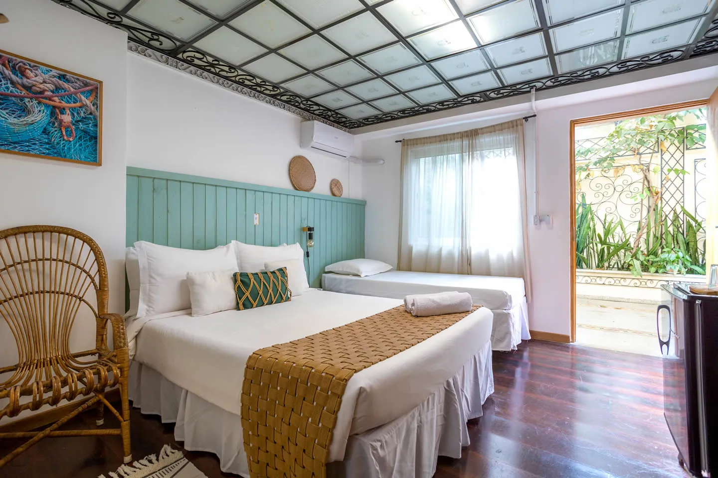 Cama de casal da Suíte Família do Vilarejo em Ilhabela